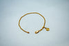 Delicate gold bracelet with heart chime