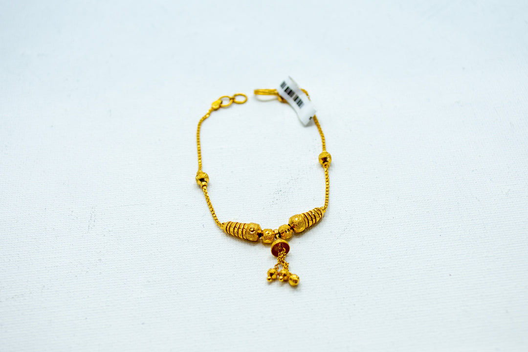 Traditional designer gold bracelet