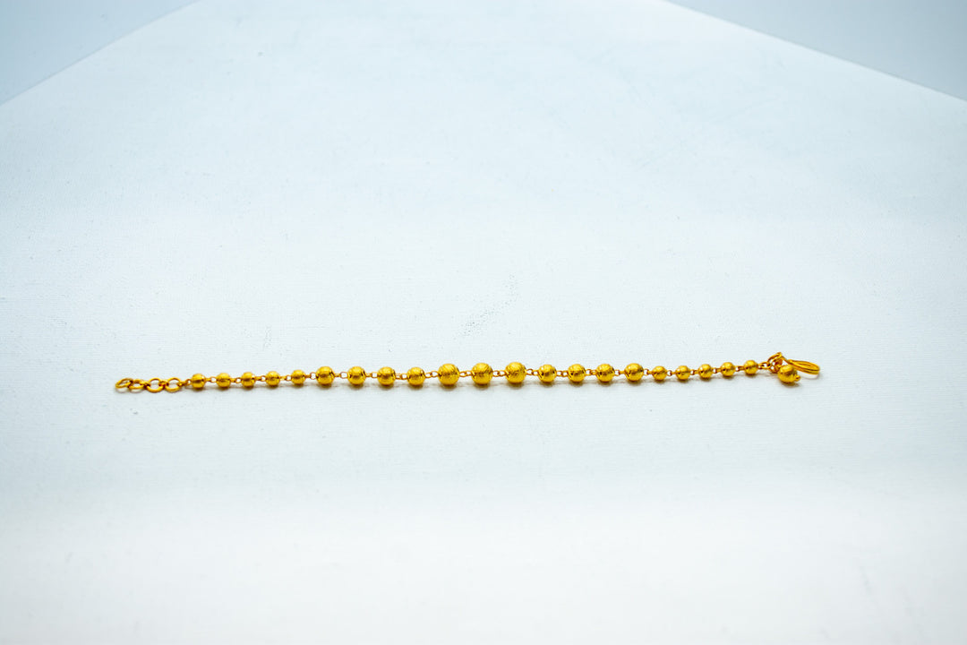 Ethnic gold beads bracelet