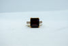 Solitare garnet-encrusted ring