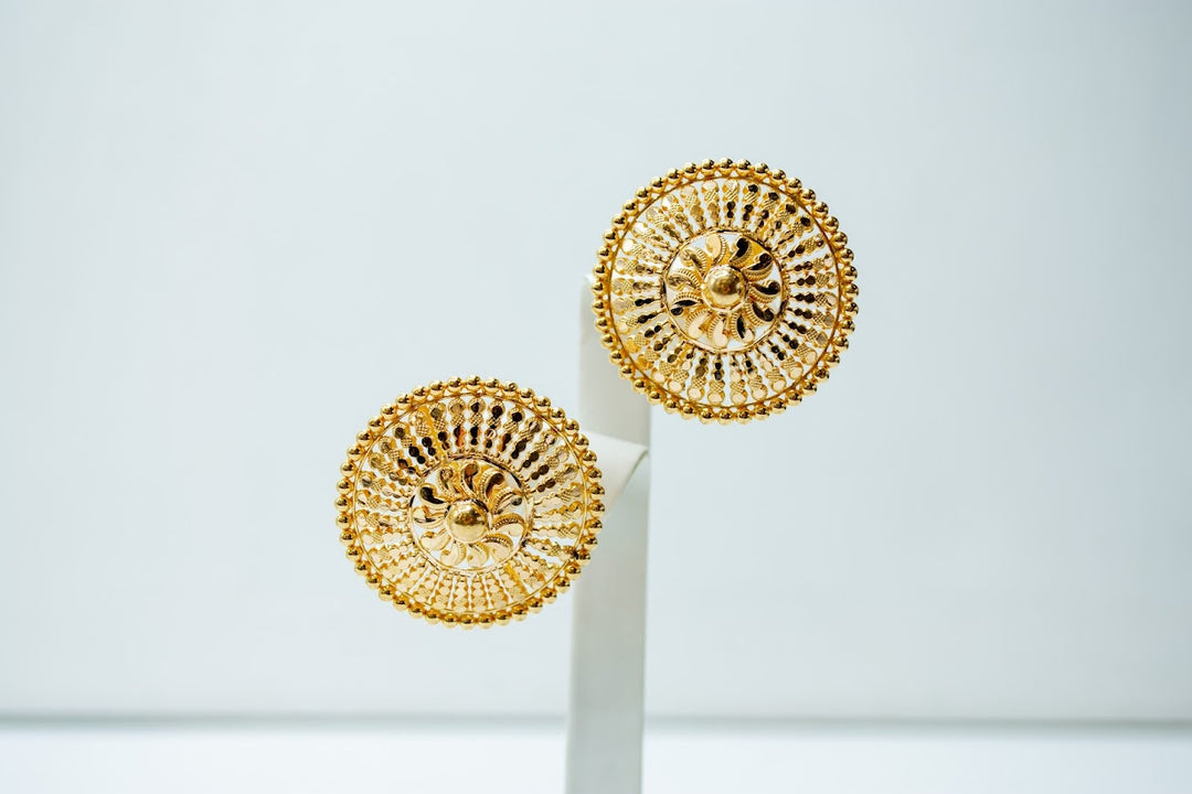 Finely detailed sun gold earrings