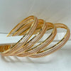 Rose-gold toned gold bangles