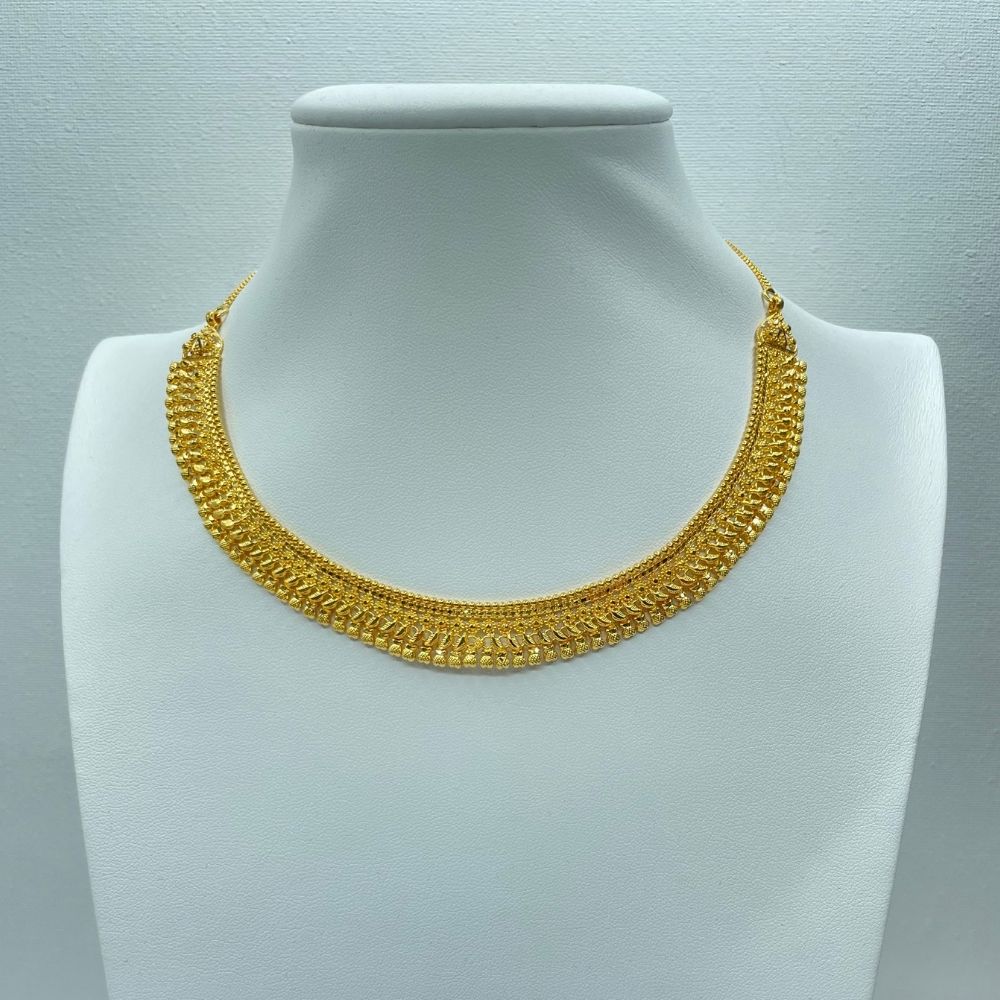 Intricate motif gold bridal necklace set