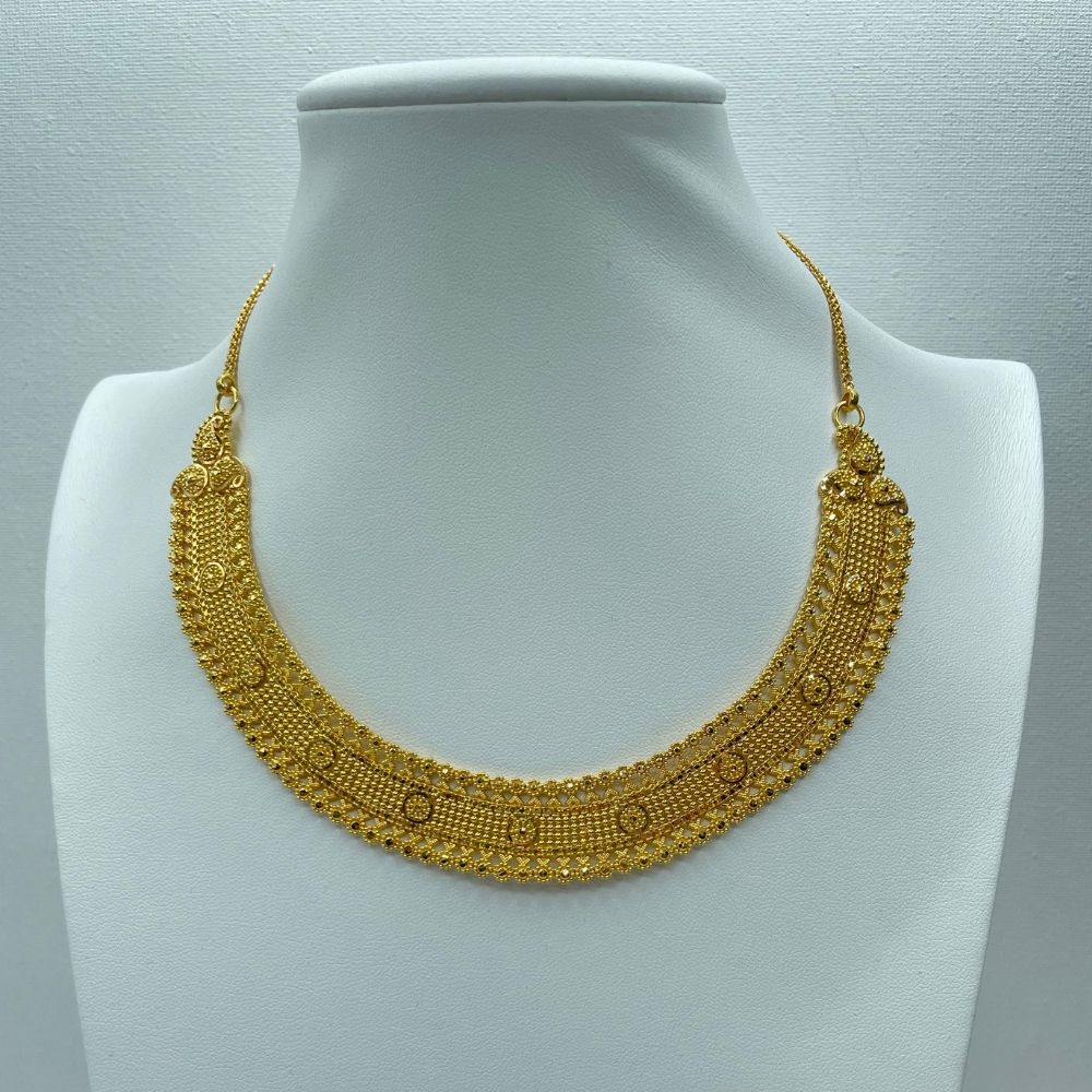 Contemporary ethnic gold bridal necklace set
