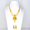 Long traditional gold necklace and earrings